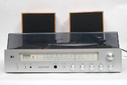 A retro PYE stereo, having record deck,