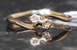 An 18ct gold ladies diamond ring.