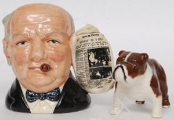 A Royal Doulton character jug entitled ' Winston Churchill '  being modelled by Stanley James