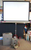 A vintage mid 20th century cased ' Specto 500 ' projector along with a boxed projector screen with
