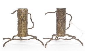 A pair of unusual early 20th century twig work brass candlesticks with cylindrical raised stems.