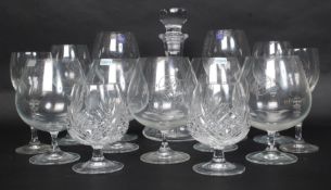 A collection of Dartington crystal glasses to include wine glasses,