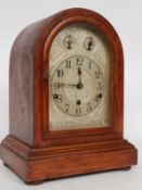 A good early 20th century quarter chiming westminster bracket clock with inset German brass
