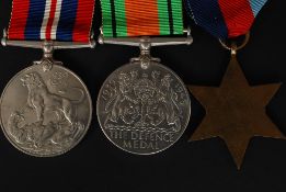 A World War Two / medal group trio ( Defence Medal, 1939-1945 Medal & 1939-1945 Star) .