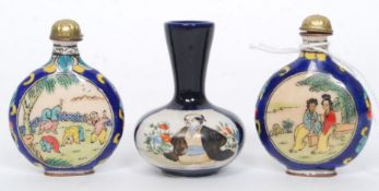 Two enamel Japanese snuff bottles showing children playing and a courting couple along with a vase