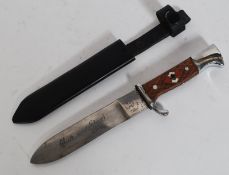 An Indian German Nazi Swastika emblazoned dagger in metal ebonised scabbard ( please see