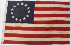 A 20th cenutry issued replica 13 star canvas American flag - Stars and Stripes 90x58cm