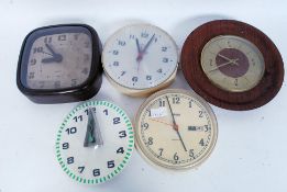 A collection of retro and retro style wall clocks to include Smiths,