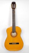 A good quality Hohner Spanish acoustic guitar in vinyl protective case.