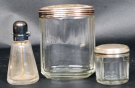 2 19th century silver top ladies dressing table jars.