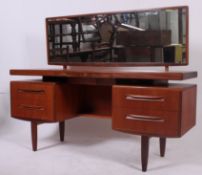 A 1970's G-Plan teak wood dressing table - chest in the manner of Mogens Kolo.
