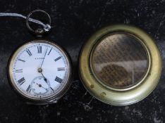 A silver hallmarked pocket watch complete with the case