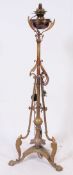 A stunning 19th century brass and copper telescopic oil lamp of rococo form having telescopic