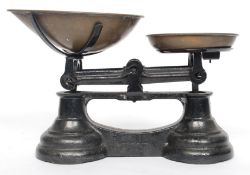 A vintage set of cast iron and brass scales - industrial. Together with the graduating weights.