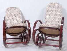 A pair of Thonet style bentwood rocking chairs having tapestry upholstered cushions,