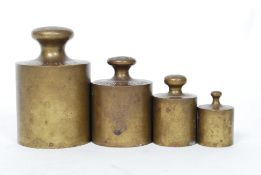 A set of vintage brass weights ( gram measurements ) previously from the vendors family sweet shop.