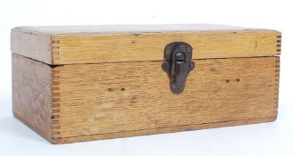 A collection of 19th century Common Prayer Books and Hymn books set within a sectioned oak casket