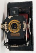 An Eastman Kodak cartridge film camera, with red bellows,
