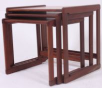 A retro danish inspired stack of three teak nest of tables,