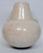 An unusual large 20th century studio pottery amphora having white crackle glaze with bulbous body