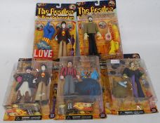 THE BEATLES: A set of 5x McFarlane Toys carded Beatles Yellow Submarine collectable action figures.
