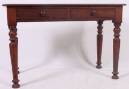 A Victorian mahogany writing table desk.