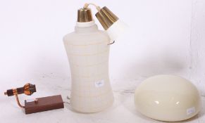 A retro 1950's cylindrical frosted glass