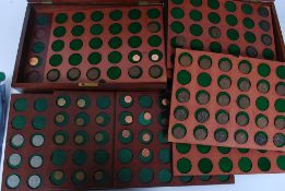 A pair of mahogany cased coin boxes dati