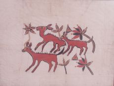 A large framed and glazed batik / screen