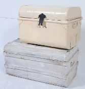 Two vintage painted tin luggage trunks,
