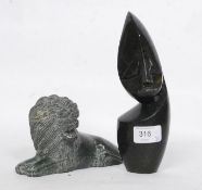 A late 19th serpentine carved lion toget