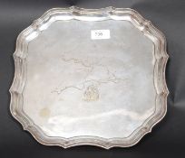 An unusual silver plate salver with inte