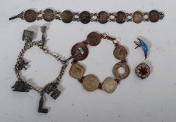 2 silver and white metal coin bracelets