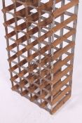 A 20th century tall wine rack having mul