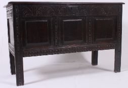An 18th century carved oak peg jointed c