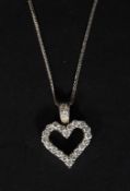 A 14ct white gold chain with diamond hea