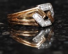 A ladies 18ct gold pave set diamond ring