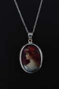A silver and pictorial enamel set plaque depicting a young lady. Total weight 9.9g.