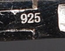 A ladies 925 silver and cz stone inset crossover bangle with teardrop shaped heads. Total weight 16.