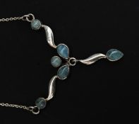 A ladies silver necklace with teardrop multiple pendant drops inset with agate stones.