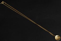 A gilded silver hallmarked ladies necklace and roundel pendant. Hallmarked with makers mark.