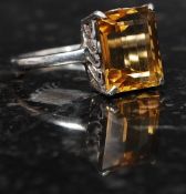 A silver 925 and citrine stone cocktail / dress ring.