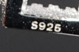 A pair of large silver and cz stone hoop earrings of linked bar design. 11.