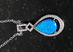 A silver and opalite  pendant necklace on silver chain. Total weight 5.