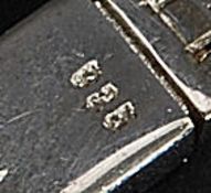 A contemporary  silver cz stone and sapphire set tennis bracelet, each stone being claw mounted.