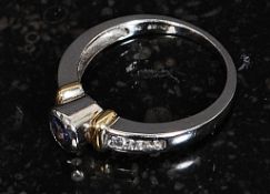 A ladies 14ct white gold sapphire and diamond ring,