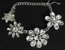 A large and impressive flower head choker necklace.