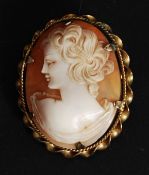 A 1950's vintage Italian hand carved cameo and rolled 9ct gold brooch..