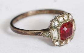 A silver and ruby garnet stone ladies dress ring.