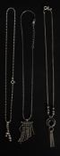 A collection of 3 silver necklaces to include ball finial drop pendants,